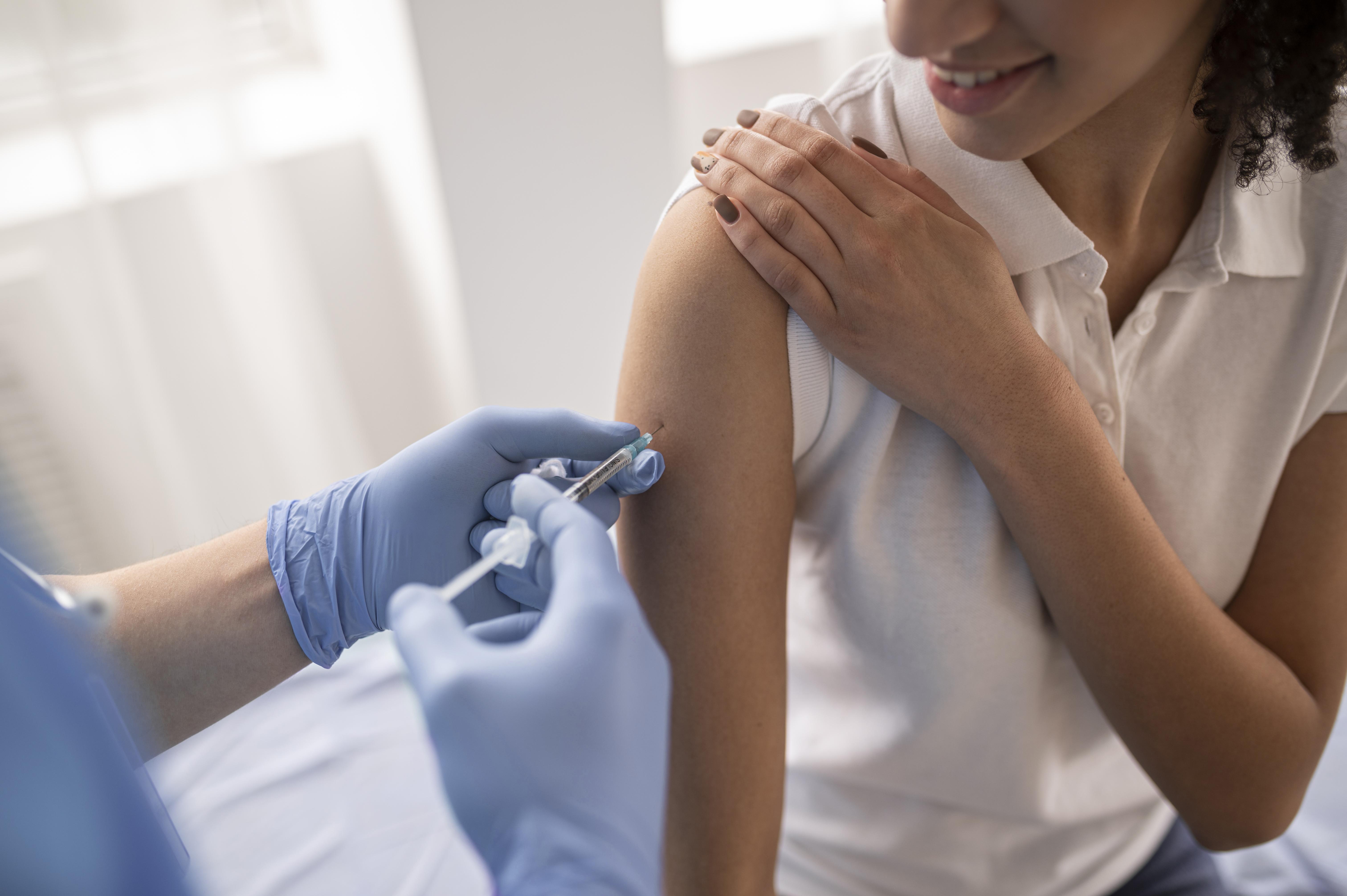 Woman getting an immunization