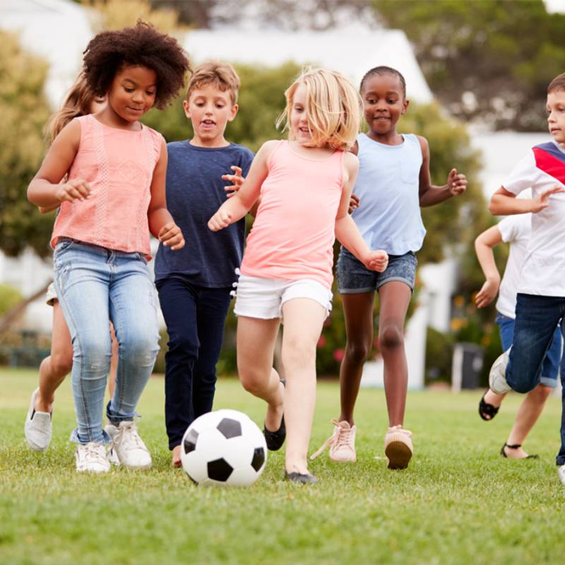 Children playing soccer